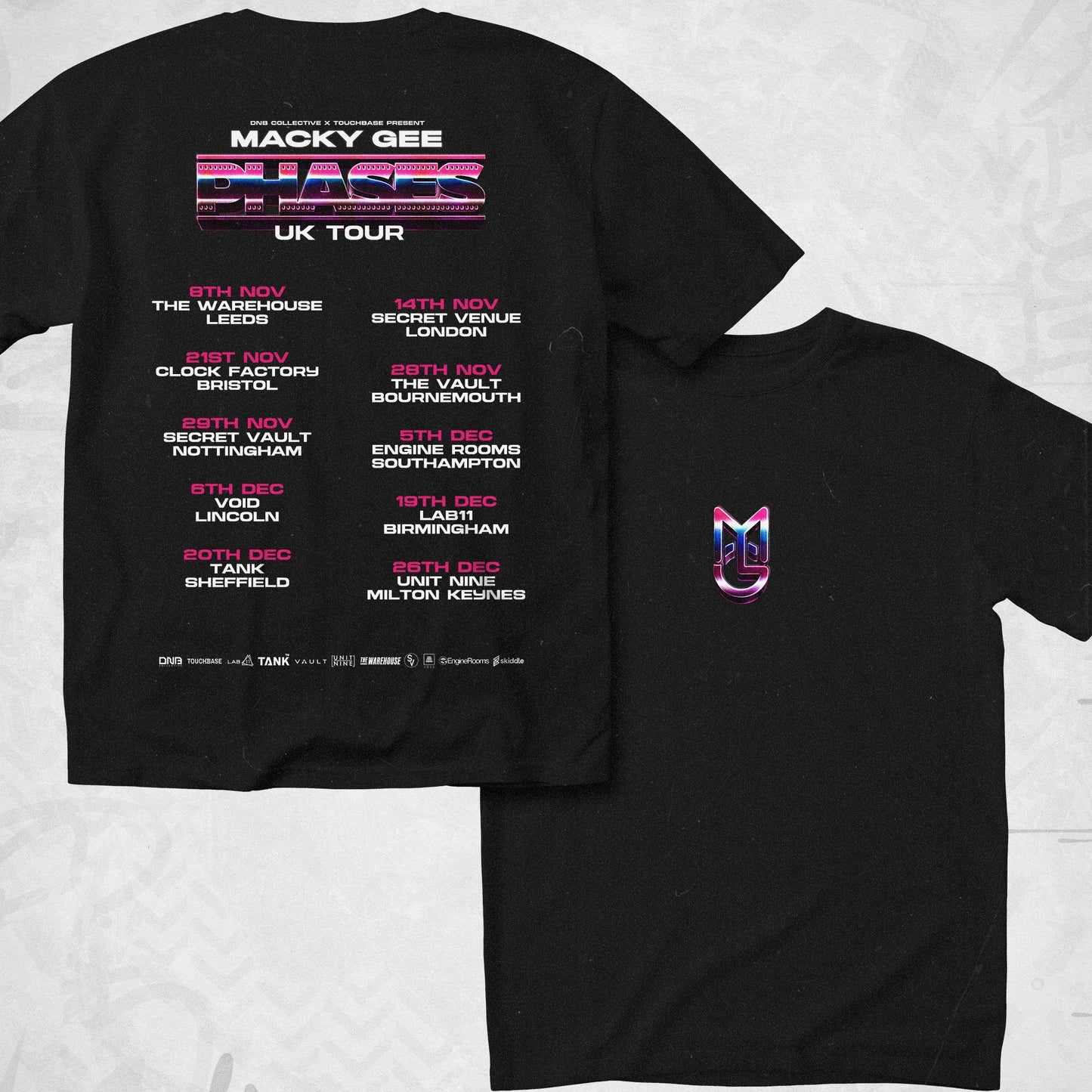 Black t-shirt with tour information and logo on a light gray background